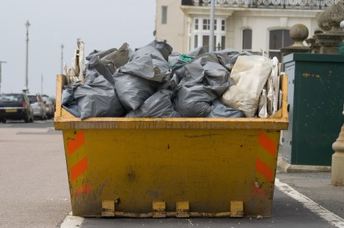 Business professionals discussing waste removal strategies in Coney Hall